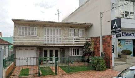 Ampla Casa Comercial no Centro com Excelente Localização