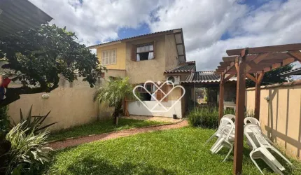 Casa Espaçosa com Amplo Pátio e Localização Privilegiada em Gravataí