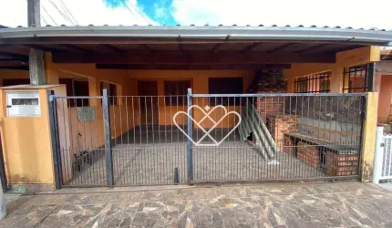 Seu Novo Lar: Charmosa Casa com Quintal e Churrasqueira no Bairro Santa Cruz