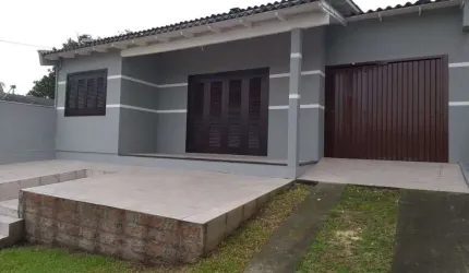 Casa com 2 Dormitórios, Garagem Coberta e Área Gourmet - Conforto e Praticidade Esperam por Você