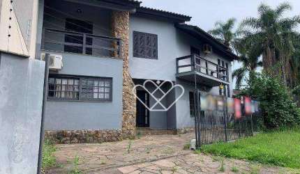 Residência à venda ou locação no bairro Dom Feliciano — espaço, conforto e localização central em Gravataí