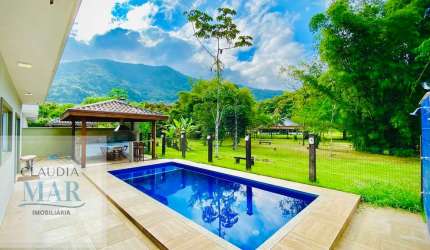 CASA COM 6 QUARTOS SENDO 5 SUÍTES EM CONDOMÍNIO NA PRAIA DA LAGOINHA