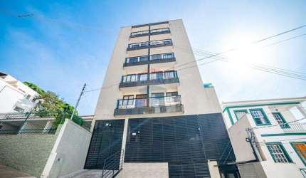 Apartamento quarto e sala no Centro, com elevador e vaga de garagem