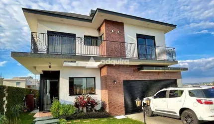 Casa à venda no Condomínio Fontana di Trevi, contendo 3 suítes, no Jardim Carvalho, Ponta Grossa, P