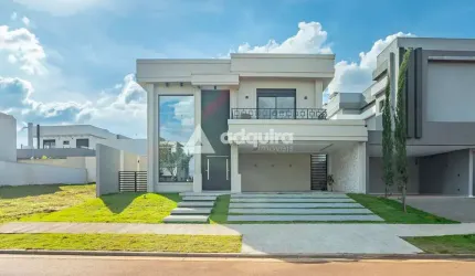 Casa à venda no condomínio Alphaville, contendo 3 suítes.