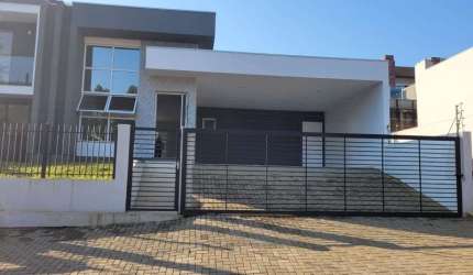 VENDA/LOCAÇÃO - CASA TÉRRA DE ALTO PADRÃO NO BAIRRO SOLAR DO CAMPO EM CAMPO BOM