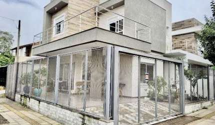 Casa com 3 dormitórios à venda, 110 m² por R$ 901.000,00 - Bela Vista - Gravataí/RS
