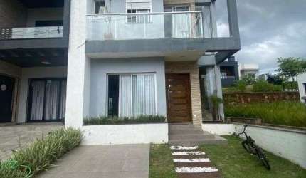 Sobrado com 3 dormitórios para alugar, 152 m² por R$ 7.997,00/mês - Primavera - Gravataí/RS