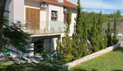Sobrado com 3 dormitórios para alugar, 270 m² por R$ 8.530,00/mês - Jansen - Gravataí/RS