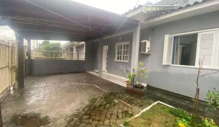 Casa com 3 dormitórios para alugar, 65 m² por R$ 1.292,00/mês - Passo dos Ferreiros - Gravataí/RS