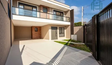 Sobrado duplex de alto padrão, com 3 suítes, sendo duas com sacada, área gourmet e 2 vagas de garag