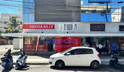 Loja comercial na Praia do Morro com 1 vaga, quadra do mar e vista para o mar