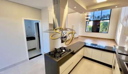 CASA TERREA COM TRÊS SUITES A VENDA NO PARQUE BRASIL 500- COND. SANTORINI - PAULÍNIA SP