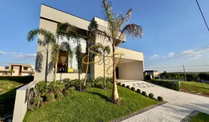 CASA TERREA COM TRÊS SUITES A VENDA NO PARQUE BRASIL 500- COND. SANTORINI - PAULÍNIA SP