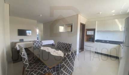Apartamento de 2 quartos com 1 suíte, 2 salas e vaga de garagem em Garopaba-SC: Oportunidade de investimento!