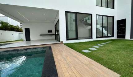 CASA NO ALPHAVILLE COM 4 QUARTOS, SENDO 3 SUITES, PISCINA, QUINTAL, ENERGIA SOLAR, CASA NOVA