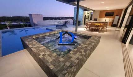 Casa de luxo em condomínio à venda em Goiânia-GO, bairro Jardins Munique: 4 quartos, 4 suítes, 3 salas, 7 banheiros, 6 vagas de garagem, 590m².