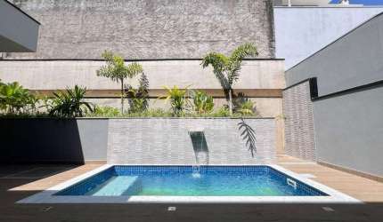 Casa com 3 dormitórios à venda, 231 m² por R$ 1.970.000 - Condomínio Portal do Jequitibá - Valinhos/SP