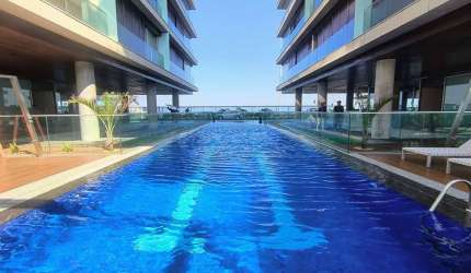 Apartamento Flat de Luxo, planejado, vista lateral Lagoa e Mar, sol matinal, no Grand Hyatt na Praia da Barra da Tijuca