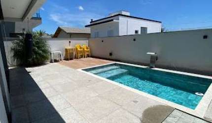 Casa com 3 dormitórios à venda, 190 m² por R$ 1.200.000,00 - Condomínio Residencial Malibu - Caçapava/SP