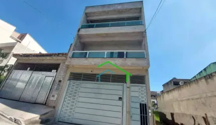 Sobrado com duas casas e salão comercial à venda