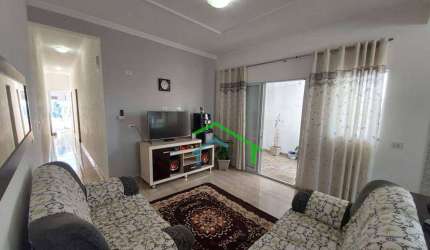 Sobrado com duas casas e salão comercial à venda