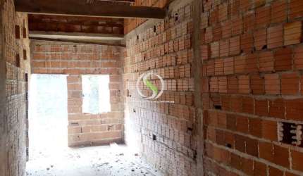 vendo uma casa em construção.