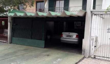 Casa com 3 quartos à venda no Tarumã, Curitiba  por R$ 630.000