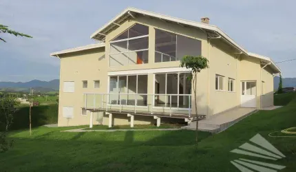 Casa com 4 dormitórios à venda, 290 m² - Condomínio Village da Serra - Tremembé/SP