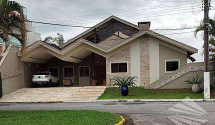 Sobrado com 4 dormitórios à venda, 450 m² - Condomínio Portal do Sol - Tremembé/SP