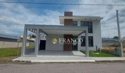 Casa com 3 dormitórios, 220 m² - venda por R$ 1.270.000,00 ou aluguel por R$ 6.810,00/mês - Condomínio Parque das Araucárias - Tremembé/SP
