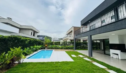 CASA EM CONDOMÍNIO FECHADO COM 3 SUÍTES