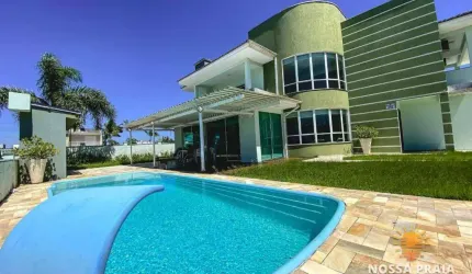 Sobrado em condominio fechado FRENTE MAR com 6 dormitórios à venda, 350m² por R$ 1.999.000 - Volta Ao Mundo II - Itapoá/SC