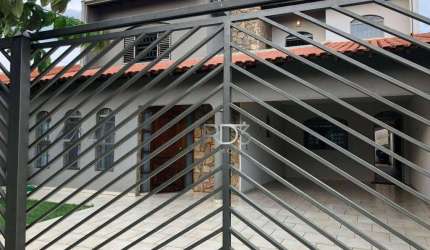 Casa com 4 dormitórios à venda, 290 m² por R$ 899.000,00 - Jardim Tarumã - Londrina/PR