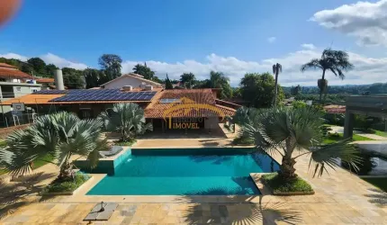Casa térrea para venda em condomínio fechado, Cotia, com 6 dormitórios, sendo 4 suítes, edícula, piscina, academia e área gourmet.