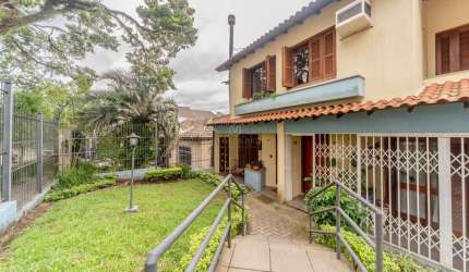 Casa em condomínio fechado com 3 quartos à venda na Rua Doutor Mário Totta, 416, Tristeza, Porto Alegre por R$ 926.000