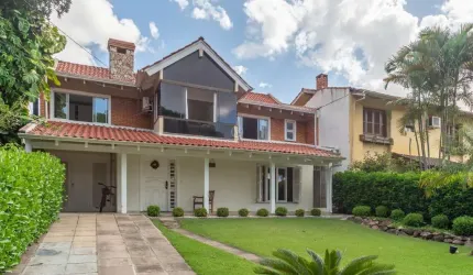 Casa em condomínio fechado com 4 quartos à venda na Avenida Juca Batista, 1200, Cavalhada, Porto Alegre por R$ 1.100.000