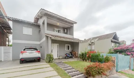 Casa em condomínio fechado com 3 quartos à venda na Rua Francisco Solano Borges, 200, Hípica, Porto Alegre por R$ 990.000