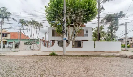 Casa com 2 quartos à venda na Rua Jacipuia, 1200, Guarujá, Porto Alegre por R$ 600.000
