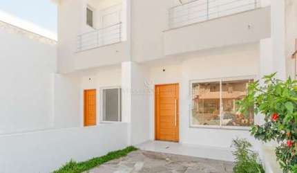 Casa com 2 quartos à venda na Rua Itacyr Rossi, 191, Guarujá, Porto Alegre por R$ 500.000