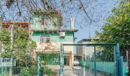 Casa com 3 quartos à venda na Rua Afonso Arinos, 467, Camaquã, Porto Alegre por R$ 890.000