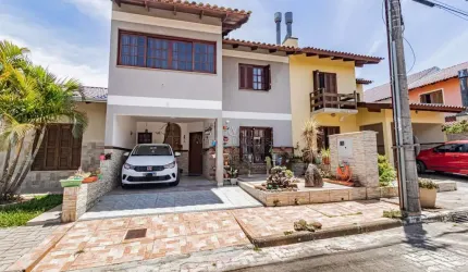 Casa em condomínio fechado com 3 quartos à venda na Rua Ponciano Pacheco da Silveira, 172, Guarujá, Porto Alegre por R$ 510.000
