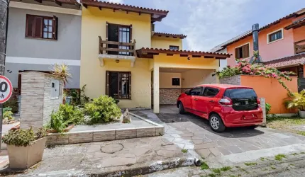Casa em condomínio fechado com 3 quartos à venda na Rua Ponciano Pacheco da Silveira, 172, Guarujá, Porto Alegre por R$ 450.000