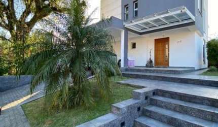 Casa com 3 quartos à venda na Rua Otelo Rosa, 172, Ipanema, Porto Alegre por R$ 1.399.000