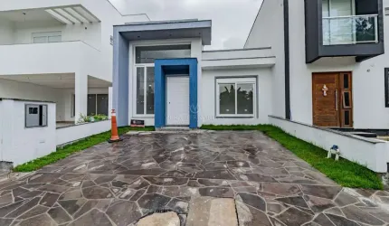 Casa em condomínio fechado com 3 quartos à venda na Rua Jorge Babot Miranda, 680, Hípica, Porto Alegre por R$ 610.000