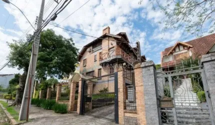 Casa em condomínio fechado com 3 quartos à venda na Rua Doutor Arnaldo da Silva Ferreira, 35, Jardim Isabel, Porto Alegre por R$ 900.000
