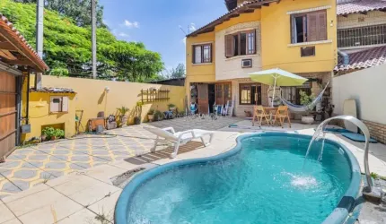 Casa com 4 quartos à venda na Avenida da Cavalhada, 6247, Cavalhada, Porto Alegre por R$ 750.000