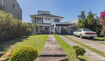 Casa em condomínio fechado com 3 quartos à venda na Avenida Juca Batista, 8000, Belém Novo, Porto Alegre por R$ 2.150.000