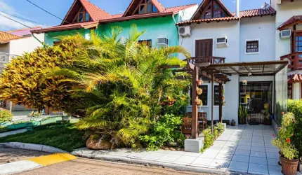 Casa em condomínio fechado com 3 quartos à venda na Rua Osório Mendes Ouriques, 332, Guarujá, Porto Alegre por R$ 500.000