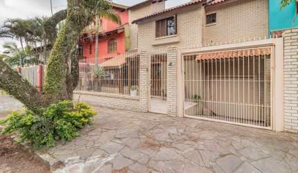 Casa com 3 quartos à venda na Rua Homero Só Jobim, 144, Ipanema, Porto Alegre por R$ 1.050.000